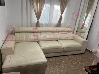 Sofá seccional de piel beige