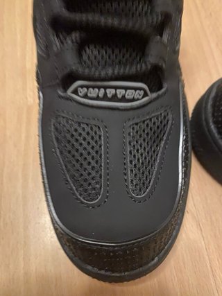 Sneakers Louis Vuitton nere e argentate