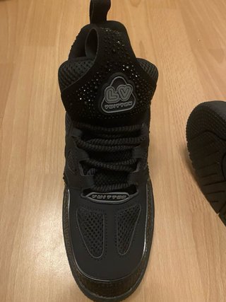 Sneakers Louis Vuitton nere e argentate