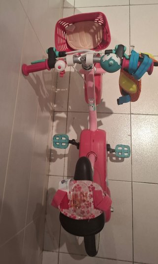 Bicicleta infantil Btwin rosa con ruedines