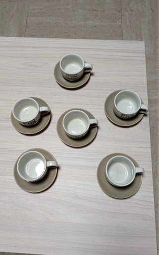 Juego de 6 tazas de café con platillos