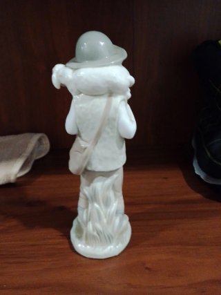 Figura antigua pastor con oveja