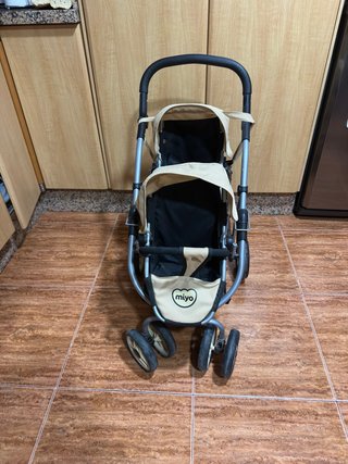 Carrito gemelar de muñecas Miyo