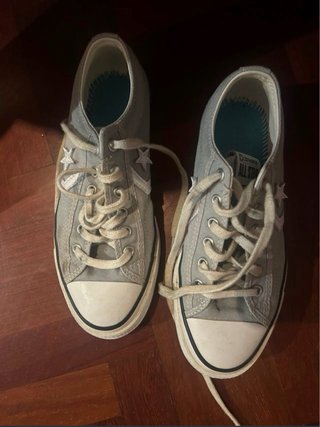 Converse bajas grises con estrella