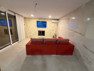 Sofá chaiselongue rojo