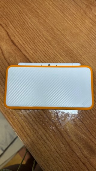 Nuovo Nintendo 2DS XL Arancione/Bianco