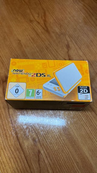 Nuovo Nintendo 2DS XL Arancione/Bianco