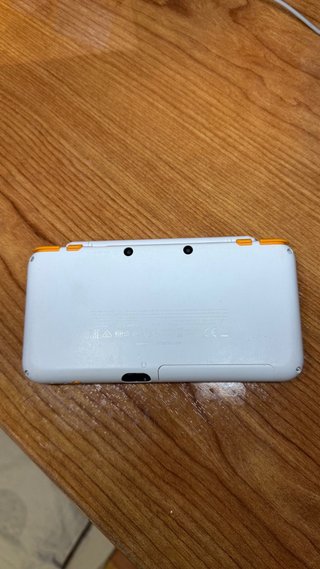 Nuovo Nintendo 2DS XL Arancione/Bianco