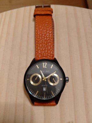 Reloj Skyline Esfera Negra y Dorado