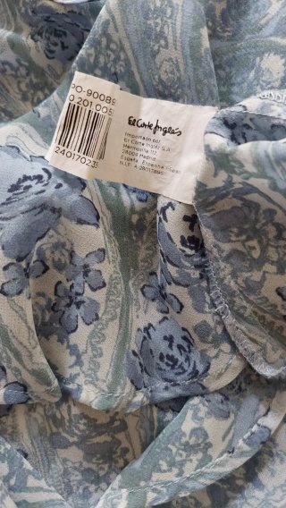Blusa con volantes azul y multicolor