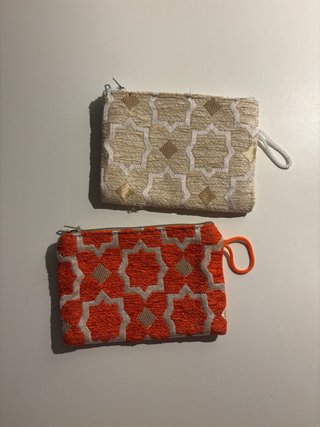 Carteras monedero beige y naranja