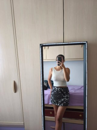 Falda corta Mango