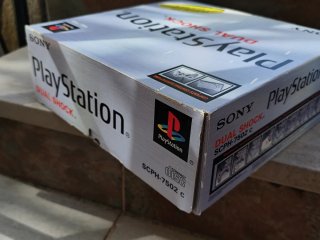 Consola PlayStation 1  con 2 mandos