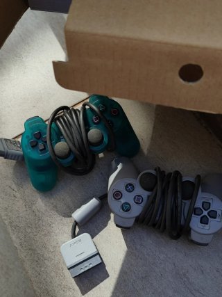 Consola PlayStation 1  con 2 mandos
