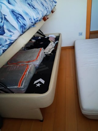 Cama nido con canapé y cabecero de forja.