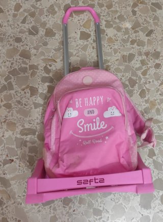 Mochila con ruedas desmontable rosa
