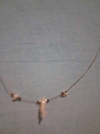 Collana con ciondolo di ramo di corallo bianco