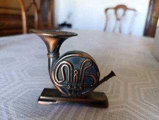 Encendedor con figura de trompa