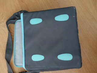 Trona portátil Munchkin gris y turquesa