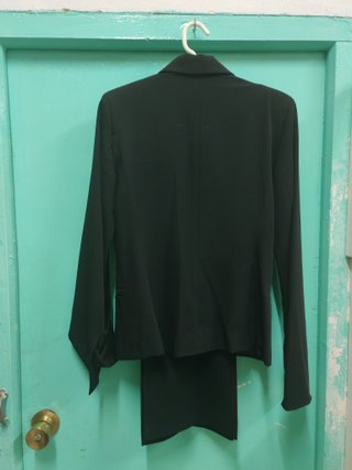 Traje de chaqueta y pantalón negro