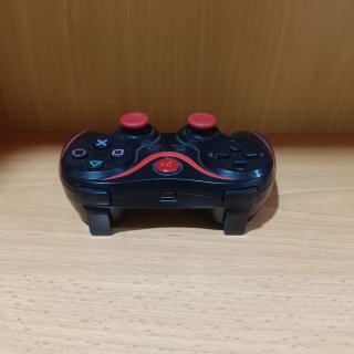 Mando PS3 inalámbrico negro y rojo