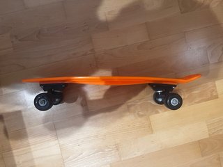 Monopatín Naranja