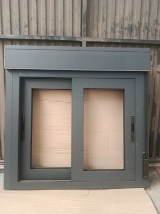 Ventana corredera aluminio gris