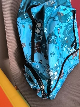 Mochila 360 floral azul y verde