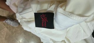 Traje de flamenca blanco con volantes