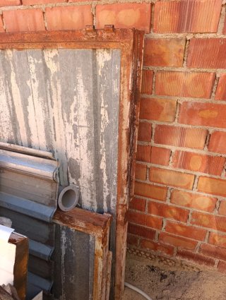 Puerta basculante metálica de chapa galvanizada