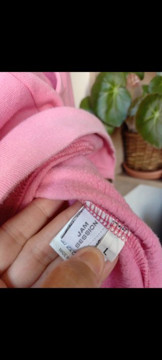 Sudadera rosa con cremallera y bordados Guru