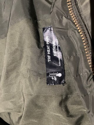 Abrigo verde con capucha y pelo
