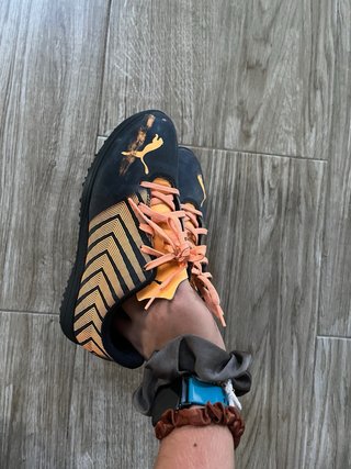 Zapatos de fútbol Puma Tacos Naranja Negro