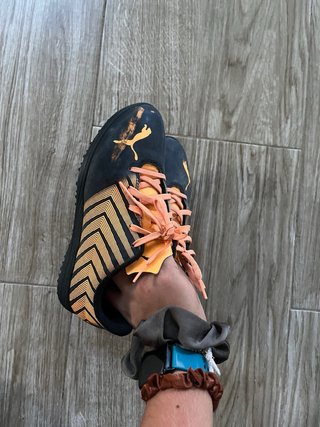 Zapatos de fútbol Puma Tacos Naranja Negro