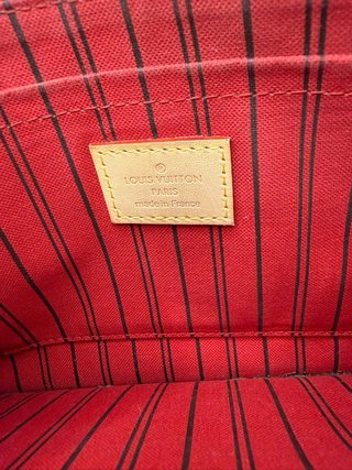 Pochette Louis Vuitton Monogram Marrón y Dorado