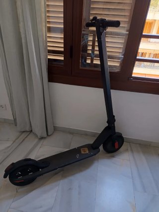 Patinete eléctrico NK con batería recién comprada