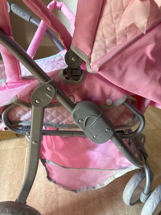 Cochecito de muñecas rosa