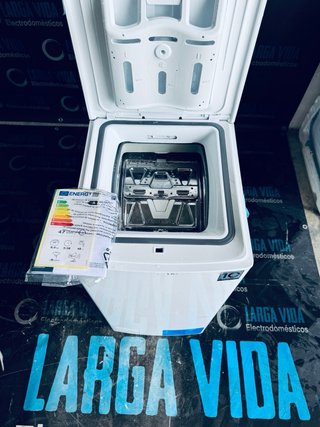 679.Lavadora Mid Carga superior 8 kilos Nueva Tara