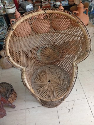 Sillón de mimbre estilo peacock