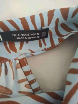 Top Zara estampado cebra azul y marrón