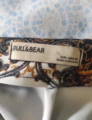 Minifalda estampada dorada y negra