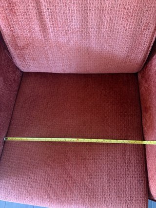 Sillón de diseño naranja y negro