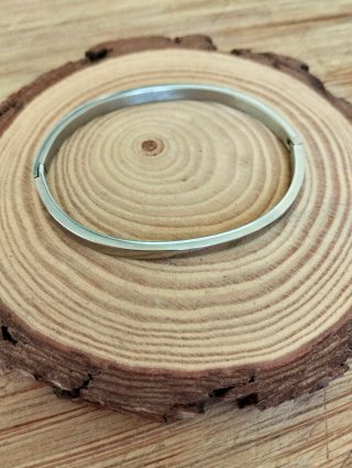 Pulsera brazalete acero.