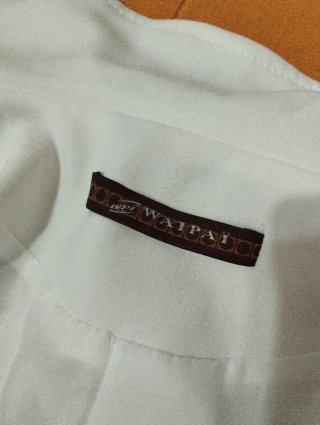 Chaqueta americana blanca