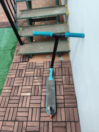 Patín Oxelo azul y negro