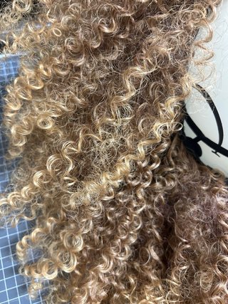 Peluca rizada rubia