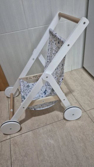 Silla de paseo para muñecas de madera