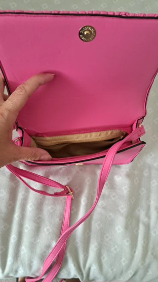 Bolso rosa fucsia acolchado