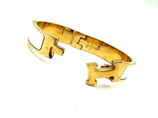 Pulsera Hermes H Dorada Blanca