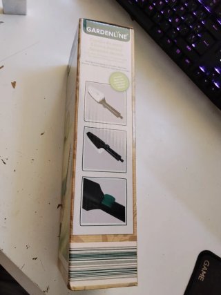 Cepillo de mano Gardenline con paso de agua